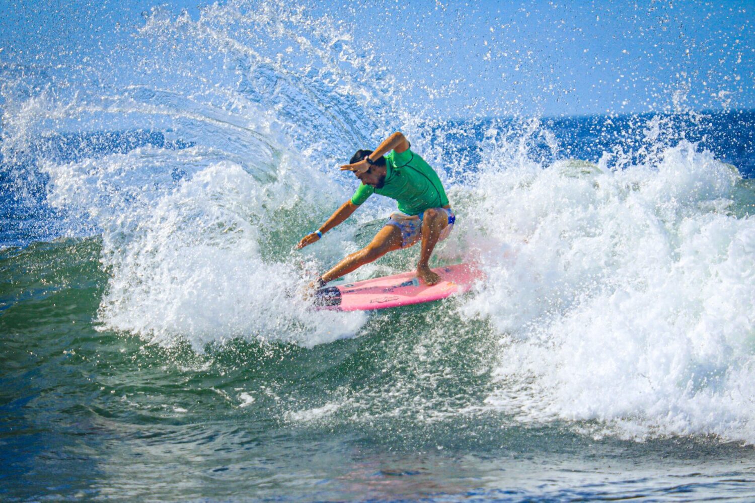 El Tunco surf lessons – surfer riding a wave in Surf City, El Salvador
