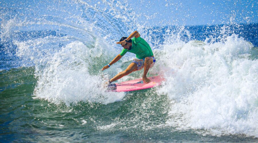 El Tunco surf lessons – surfer riding a wave in Surf City, El Salvador
