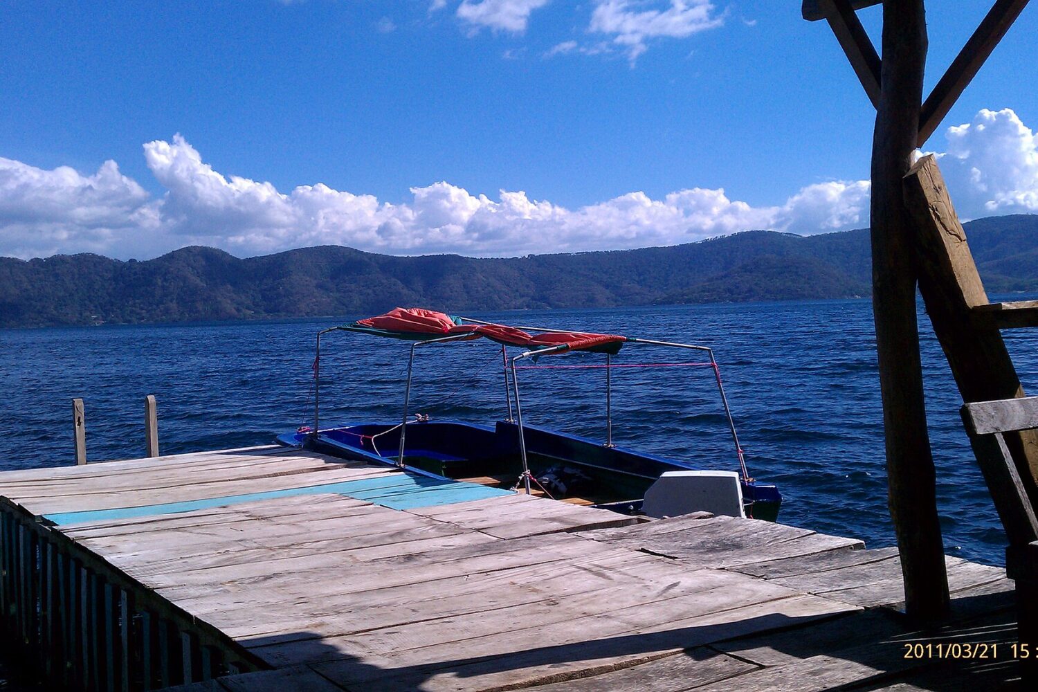 Wooden pier for swimming on Lake Coatepeque